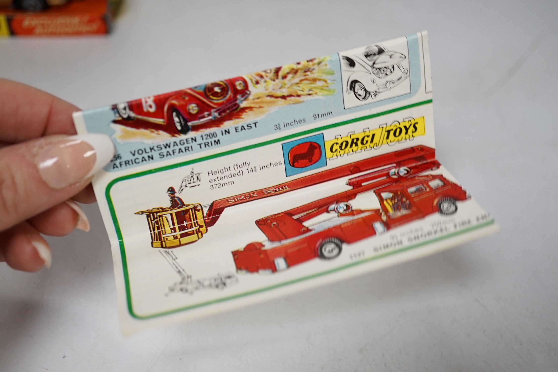 Corgi Toys James Bond's Aston Martin (261) in gold, boxed with driver, passenger, inner display tray, correct leaflet advertising other Corgi models and a ‘Secret Instructions’ envelope containing instructions and unused